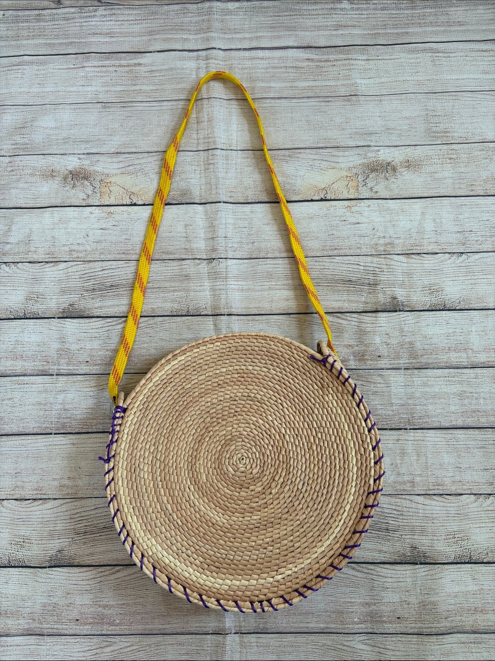 Handwoven Round Straw Crossbody Bag with Yellow Strap